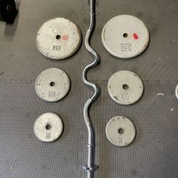 Weight Plates. /. Curl Bar.        70 Dollars 