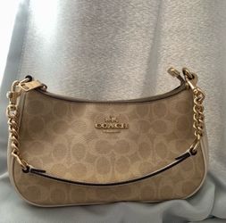 Coach Nolita signature