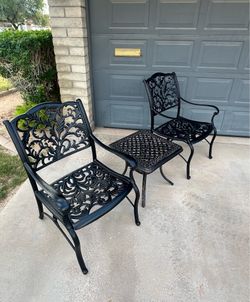 Patio set. Chairs and a table. Bistro style. Very nice condition.