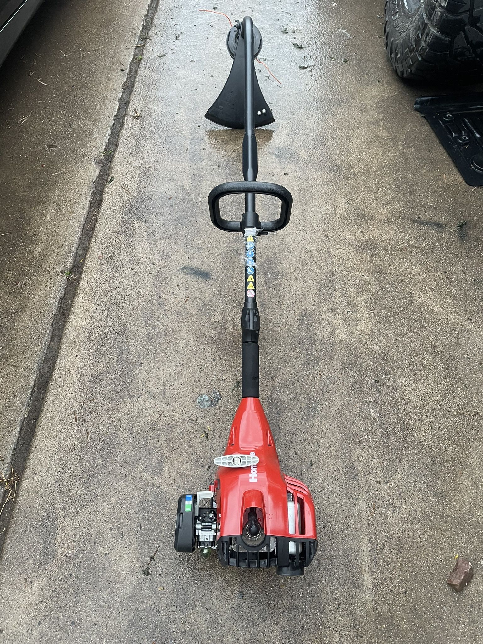 Homelite 2-Stroke 26 cc Curved Shaft Gas Trimmer