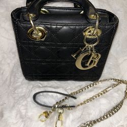 Black quilted hand bag