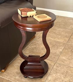 Two brown side tables
