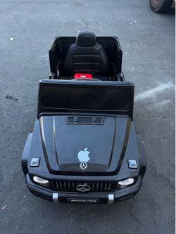 TOKTOO Juguete de Paseo 12V con Energía Mercedes-Benz G63 con Licencia para Niños, Carro Eléctrico para Bebé con Control Remoto para Padres, MP3, Faro