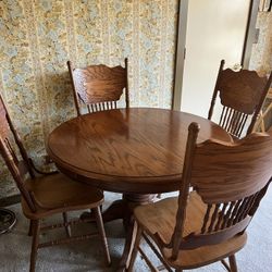Round Solid Oak Dining Table With Leaf 4 Chairs for Sale in