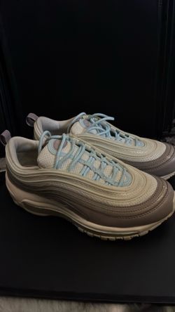 Nikes size 7 1/2 woman with matching Nike body suite