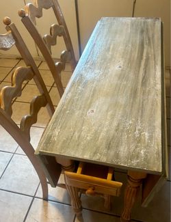 Small adjustable table w/ 2 chairs