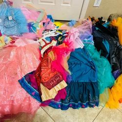 27 Brand new Disney princess dresses-one size fits most-$80 for all-price is firm; will not separate. :) Higley and ray 