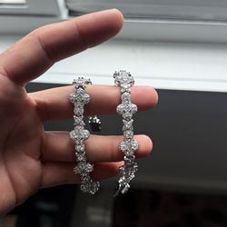 Cross Bracelet 7in $150 for both.