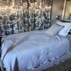 Twin bed with trundle under