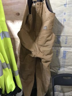 Pair of insulated cover all bibs