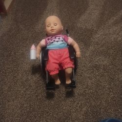Baby On A Wheelchair