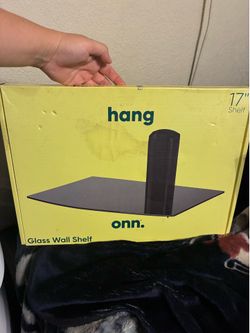Hanging shelf for under TV