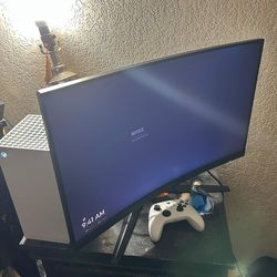 Xbox series X with elite controller and Tv monitor