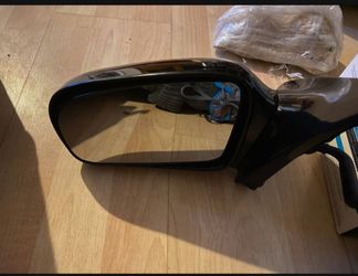 New driver side mirror
