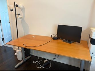 office desk with standing lamp