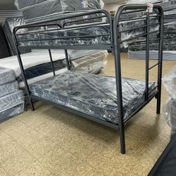 Metal bunk bed twin over twin with 2 mattress included available for pick up or delivery 