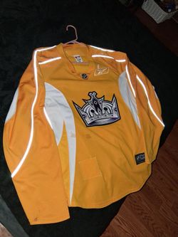 La kings practice jersey with fight straps