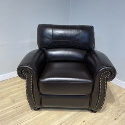 Dark brown leather arm chair