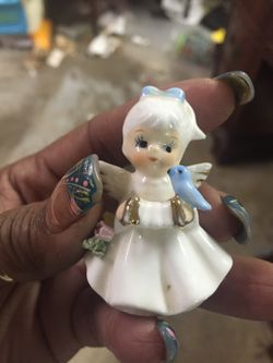 Antique Curio Porcelain figurine