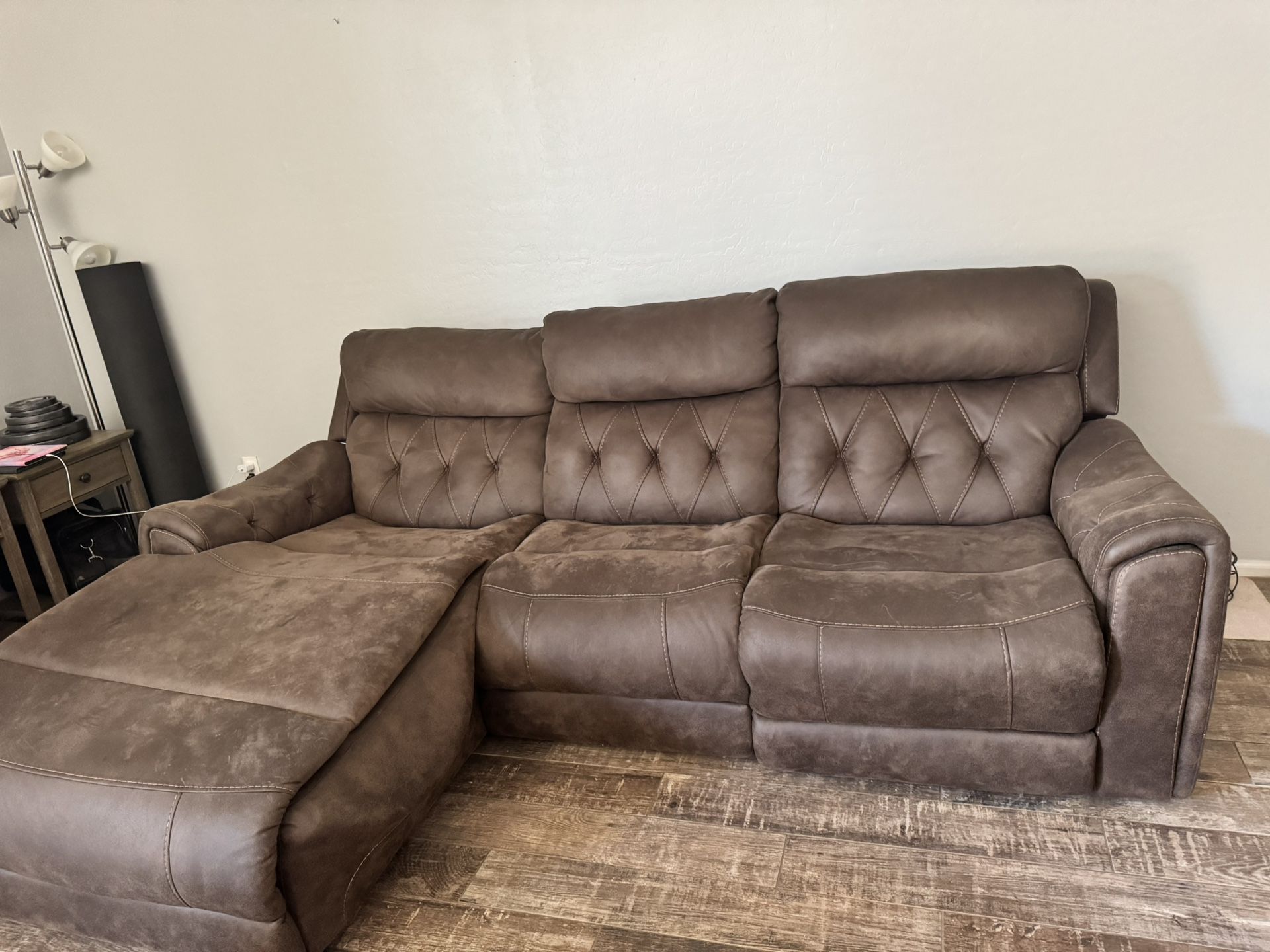 Brown faux-leather, diamond-stitched, reclining zones