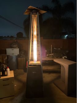 Tall pyramid-style outdoor patio heater. $140 OBO