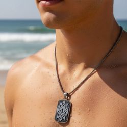 NWT Stainless Steel Black Plated Tribal Celtic Knot Dog Tag Pendant Necklace. This item is a men's stainless steel and black plated pendant necklace, 