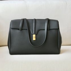 High-end, sophisticated leather tote with black gold trim, dimensions: 38 X 26 X 18cm

