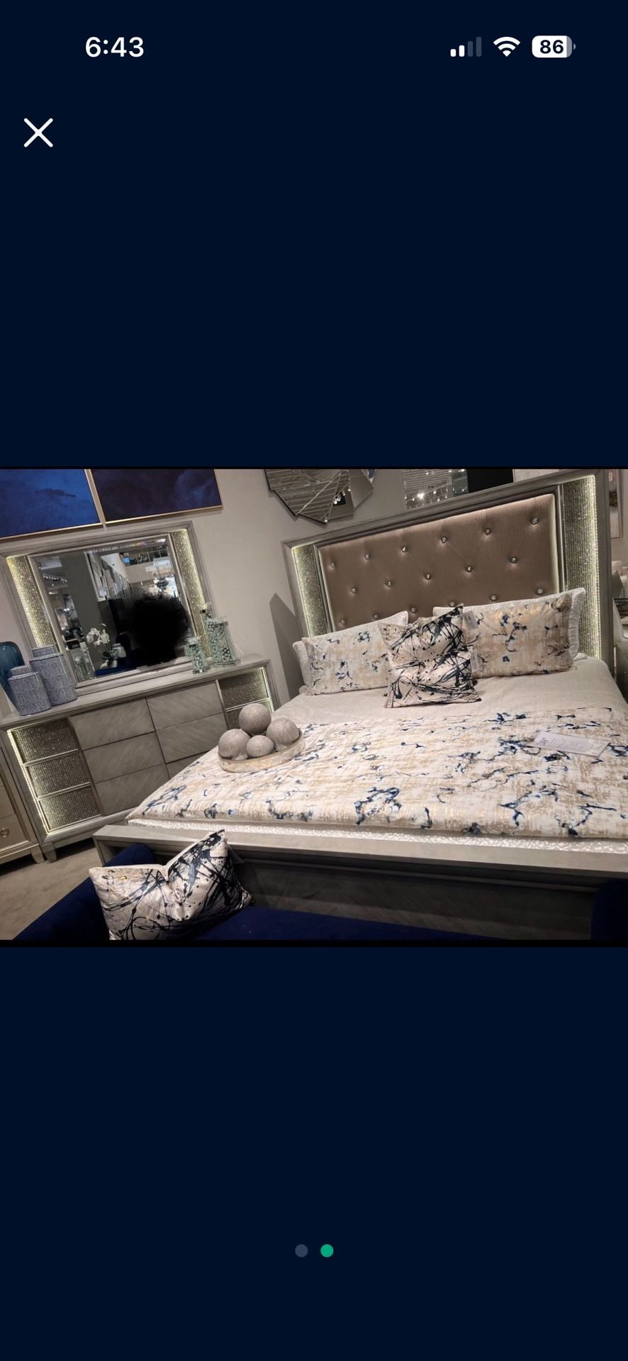 King Bed With A Dresser And Mirror
