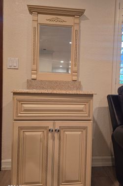 Bathroom small vanity  with granite,  and ceramic sink and mirror .185 or best offer
