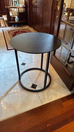 Round metal side table