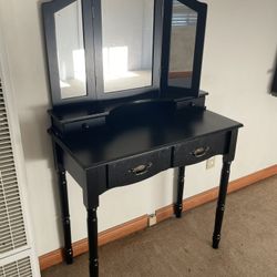 Black vanity with mirror 