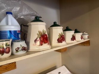 7 piece Ceramic Canister and Creamer Set with Apple Design