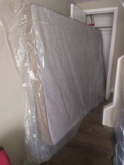 QUEEN BOX SPRING MATTRESS ONLY WITH PLASTIC COVERING USED BUT NOT TOO MUCH.