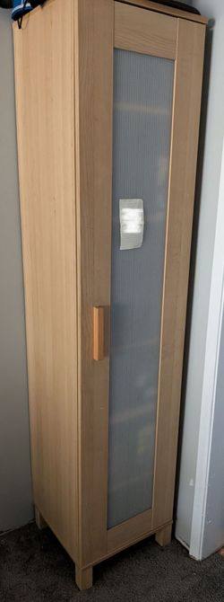 IKEA bookshelf with door storage used