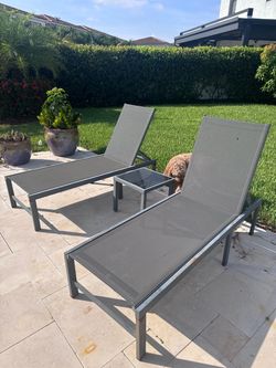 2 Metal Lounge chairs with Matching Glass Top Table