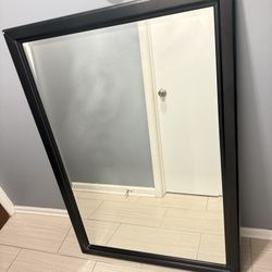 Mirror In Wooden Frame 