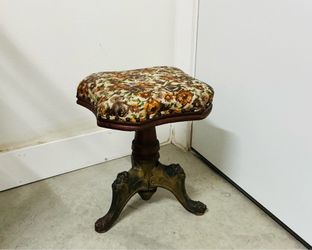 Antique Style Cast Iron & Wood Piano Stool- Upholstered Seat. ( one loose leg )