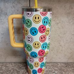 Large Happy Face Tumbler With Straw and Handle.