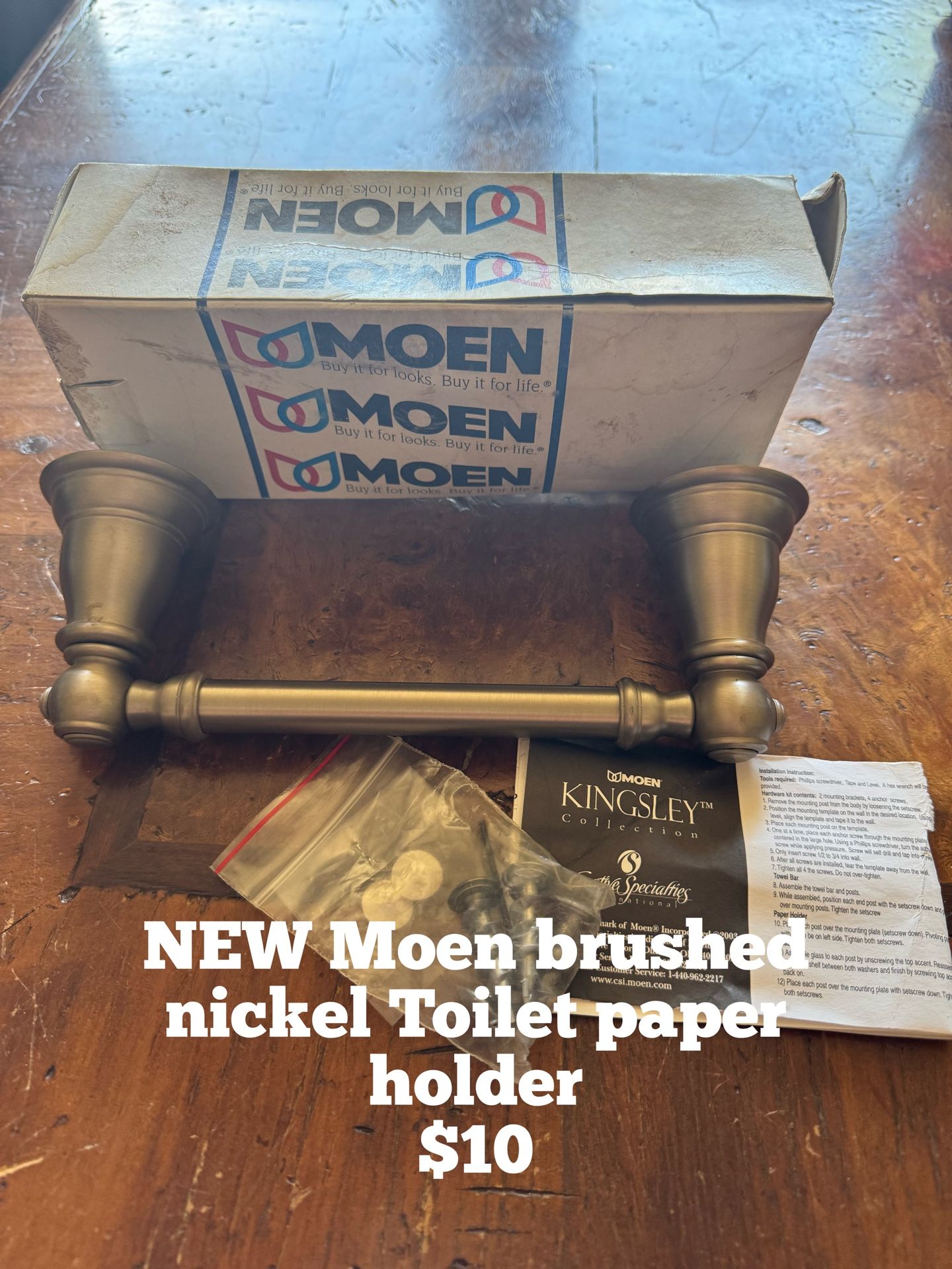 NEW Moen Brushed Nickel Toilet Paper Holder $10 - Corrales