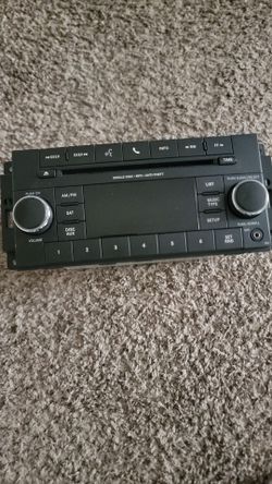 Factory Mopar RES 130S Radio CD Player AUX High

Speed Bus - Tested / Working