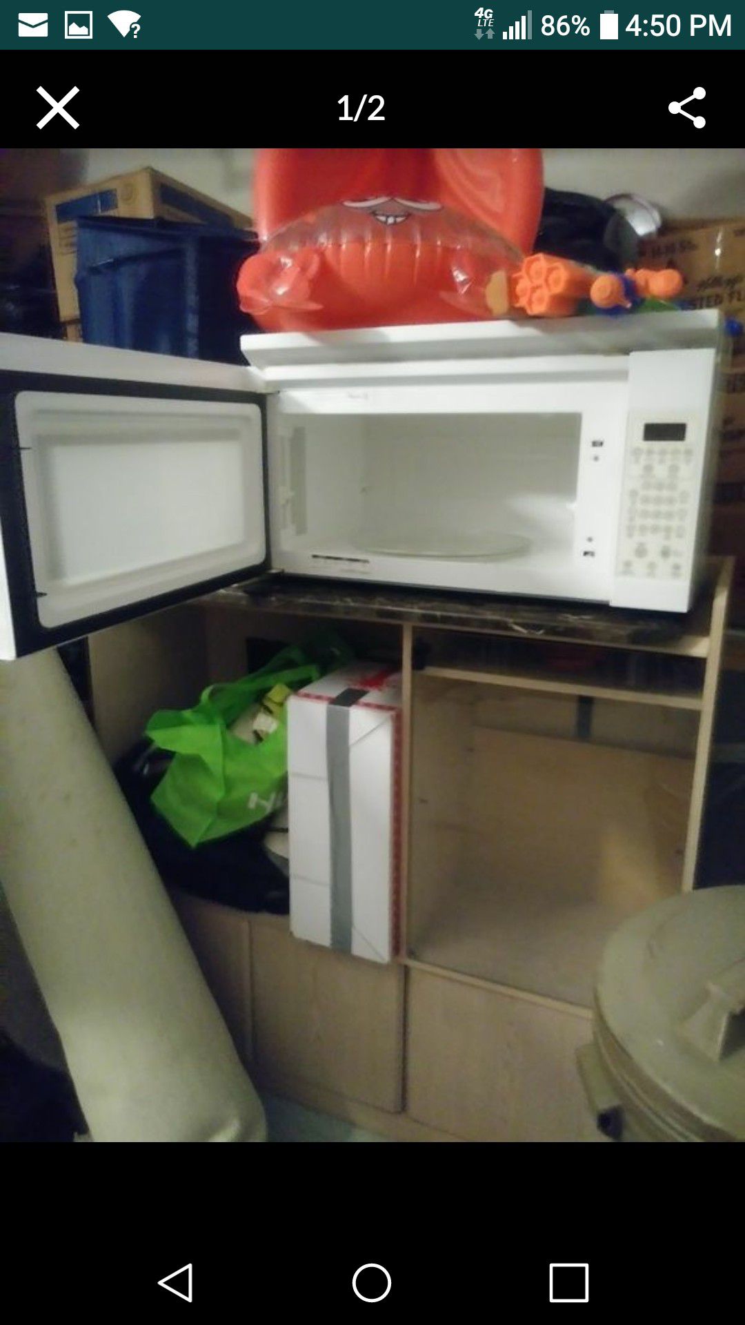 Large microwave clean, and works good. It has a small crack in the bottom left corner of the outside lining that decorates the microwave