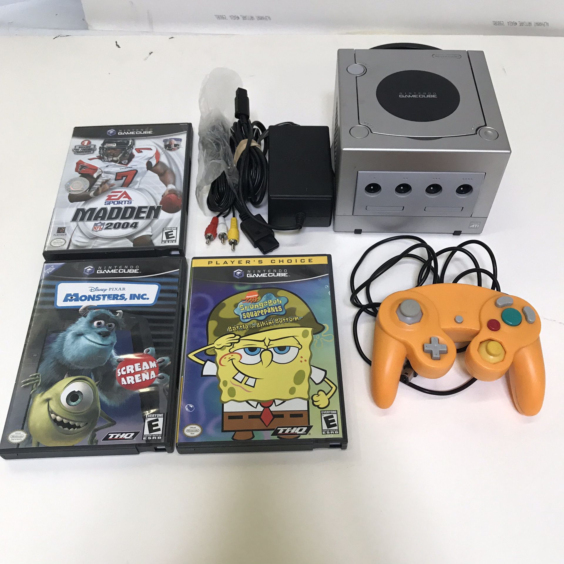 Silver Nintendo Gamecube system console with 3 games and controller