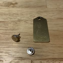 Coach silver circle earrings and Coach tag