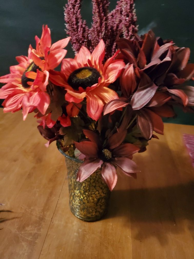 Flowers with mosaic vase