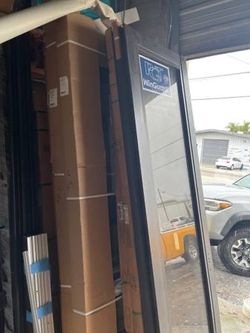 3 37” X 96” Bronze SH Window Impact Anodized Clear