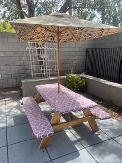 Picnic table with umbrella