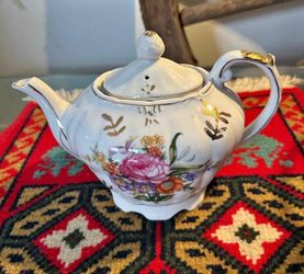 CAFETERA ANTIGUA DE PORCELANA FILETEADA DISEÑO CAJA MUSICAL