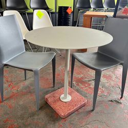 Used Hay Round Table With Pink Polished Granite Base