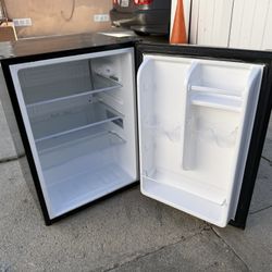 Small Fridge In Excellent Condition  19” Wide  18” Side  27” High 