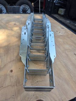 Simpson Strong-Tie IUS2.56/11.88 joist hanger.